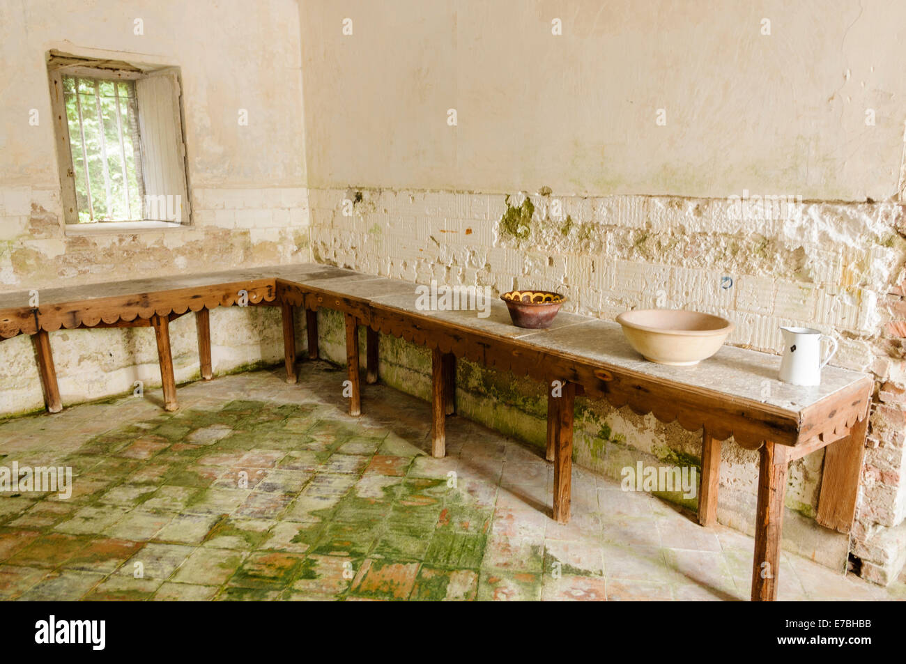 Old fashioned traditional Irish dairy with marble tables for making butter. Stock Photo