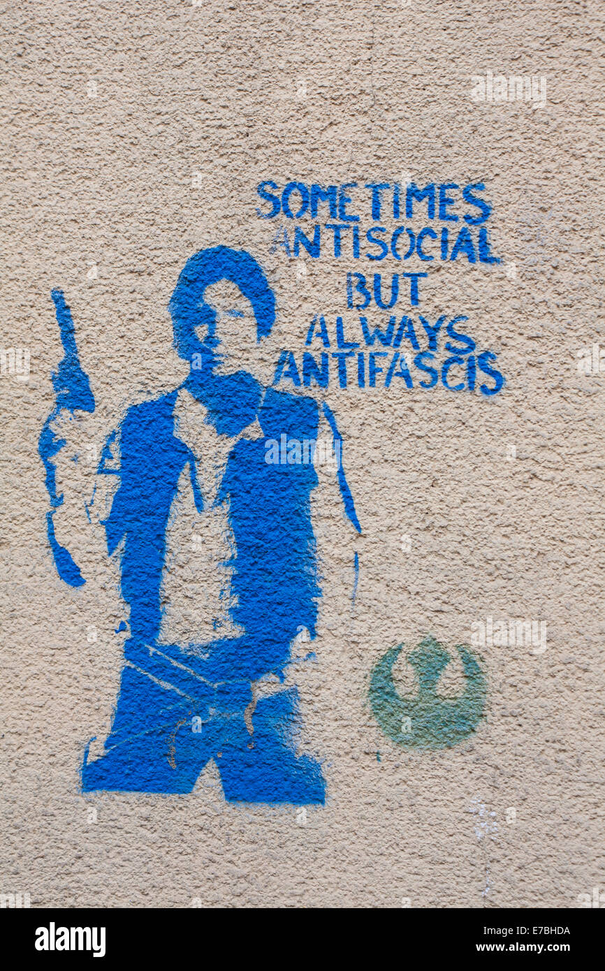 sometimes antisocial but always antifascist street graffiti artwork on wall at in Old Town, Krakow, Poland Stock Photo