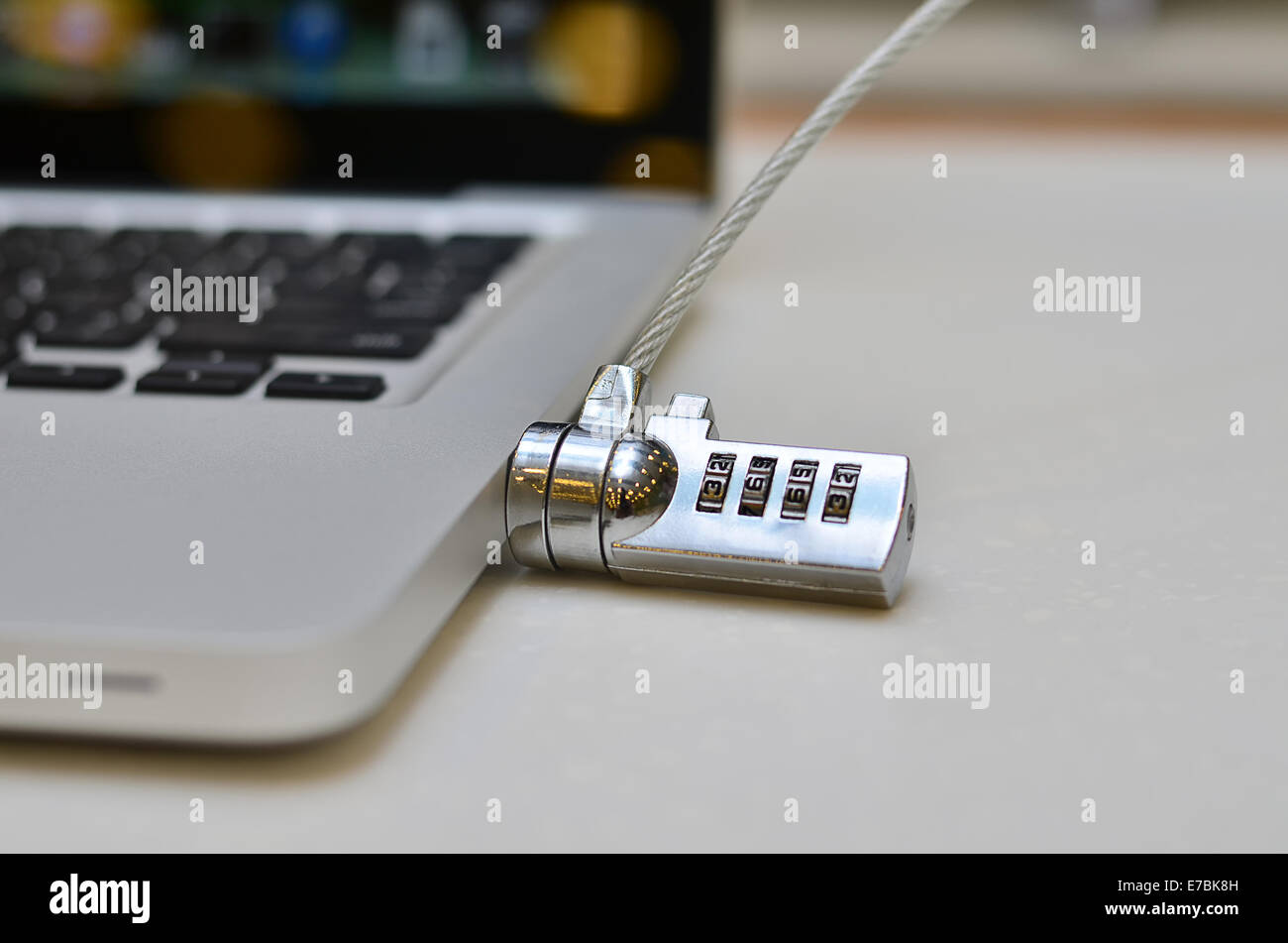 Laptop locked with a key padlock Stock Photo Alamy