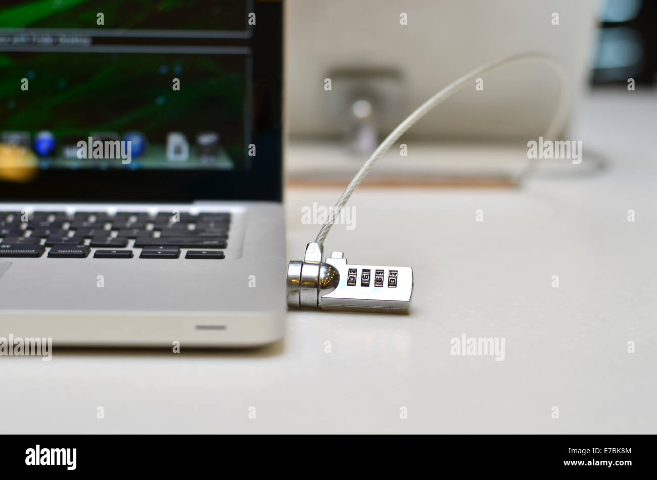 Laptop locked with a key padlock Stock Photo Alamy