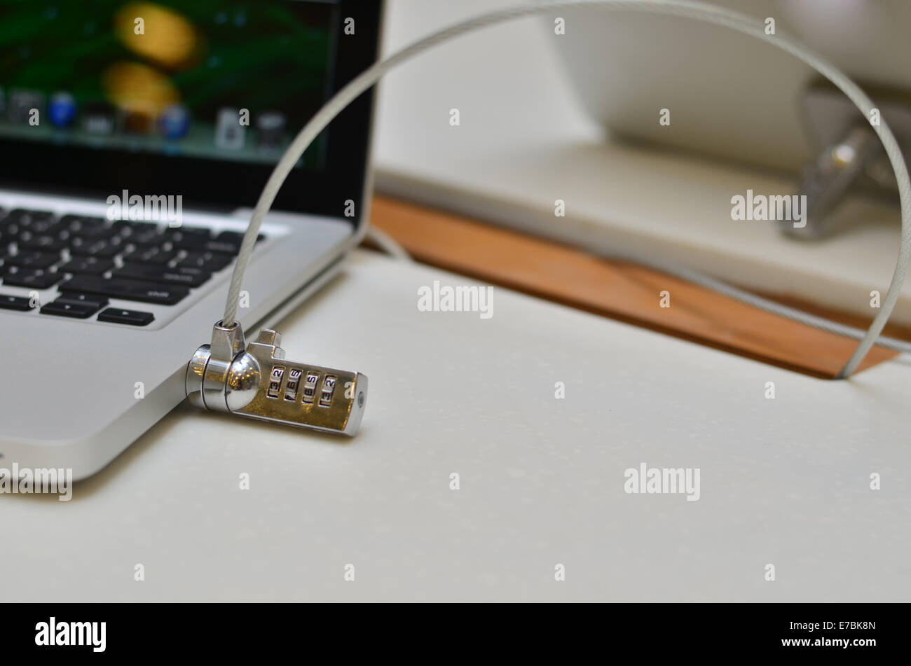 Laptop locked with a key padlock Stock Photo Alamy
