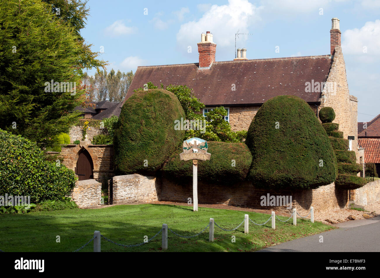 Topiary in Boughton village, Northamptonshire, England, UK Stock Photo