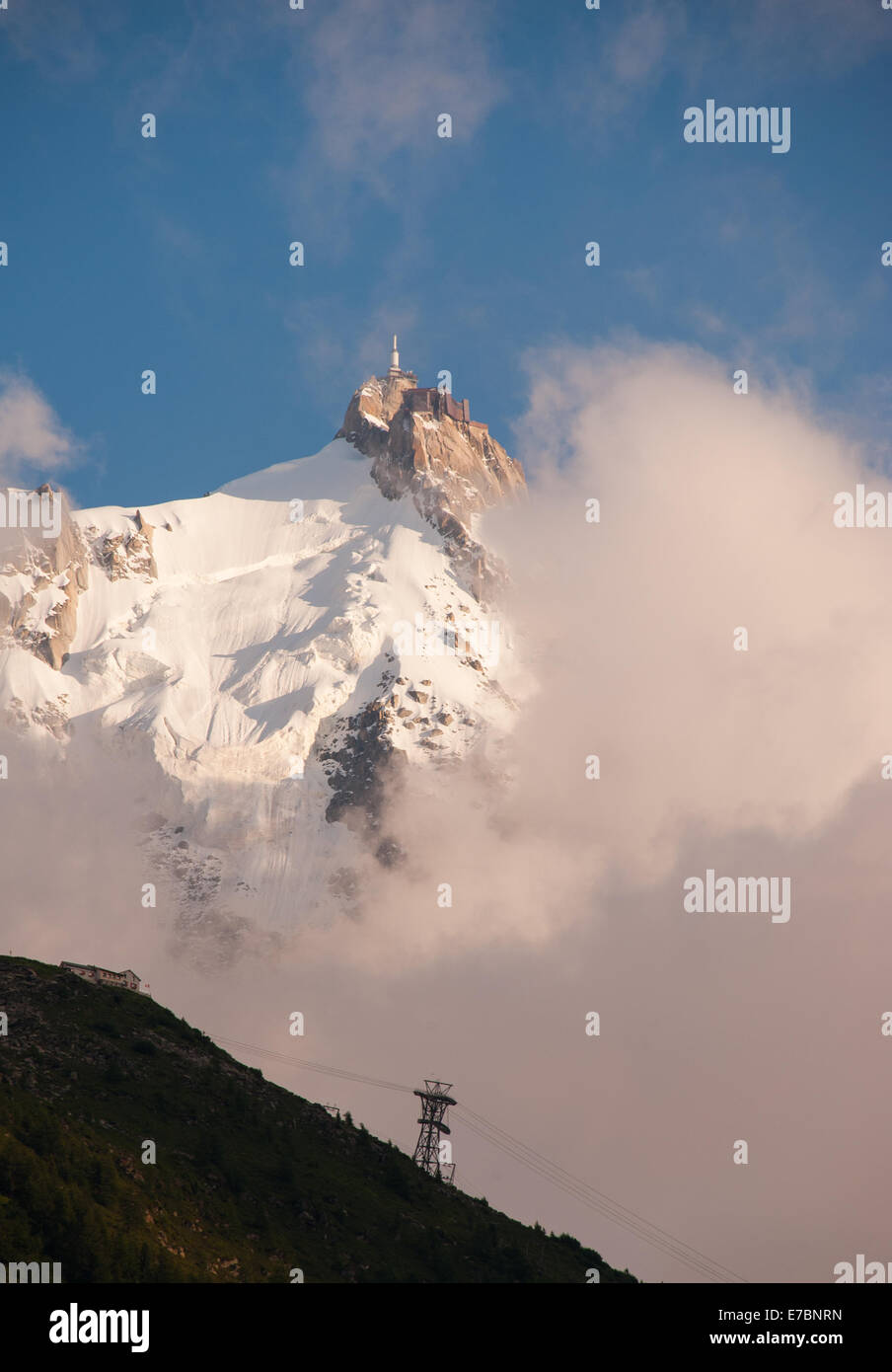 Aguille Du Midi appearing from cloud, French Alps, Chamonix, France Stock Photo