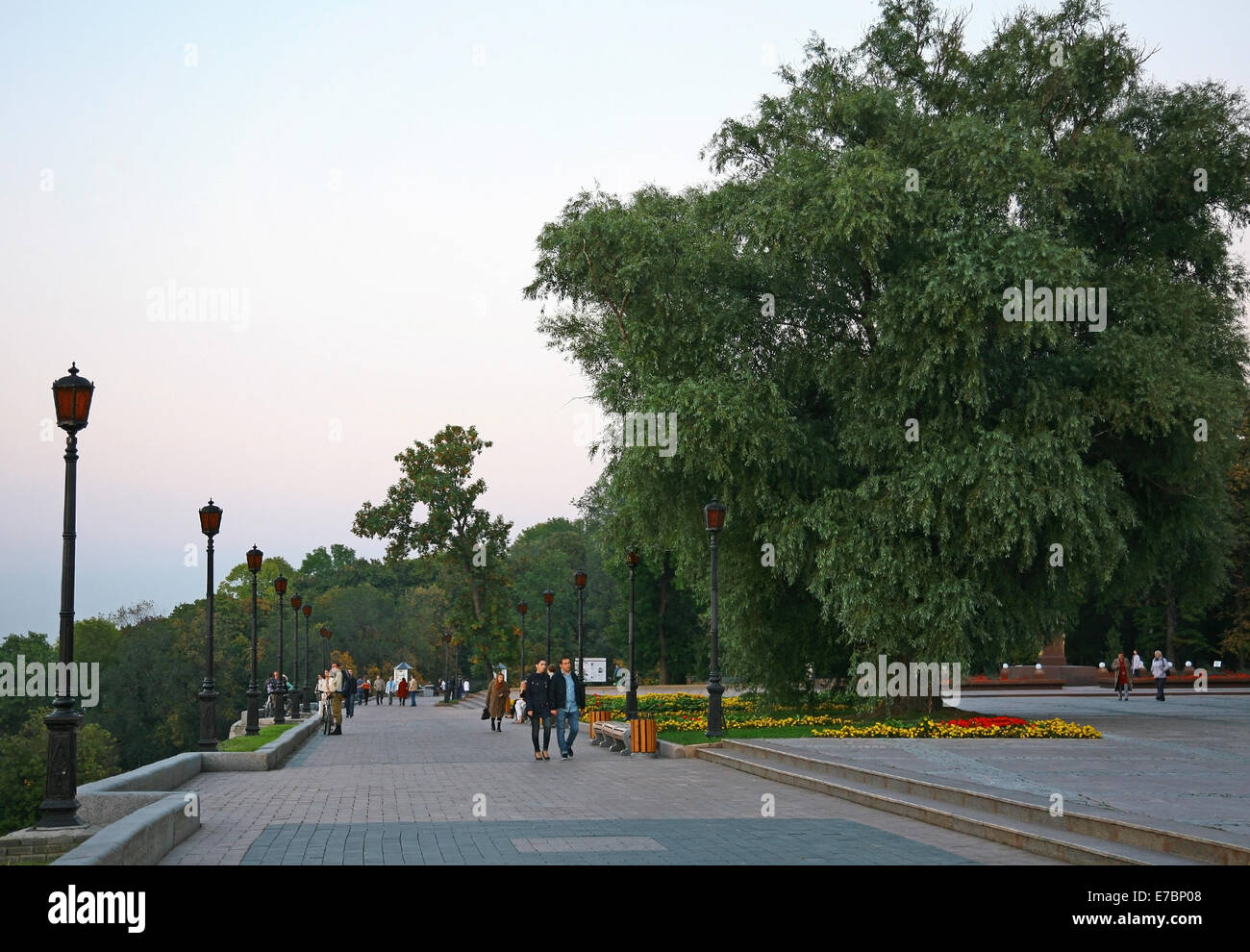 Beautiful autumn alley in the Kremlin at the evening sunset Stock Photo
