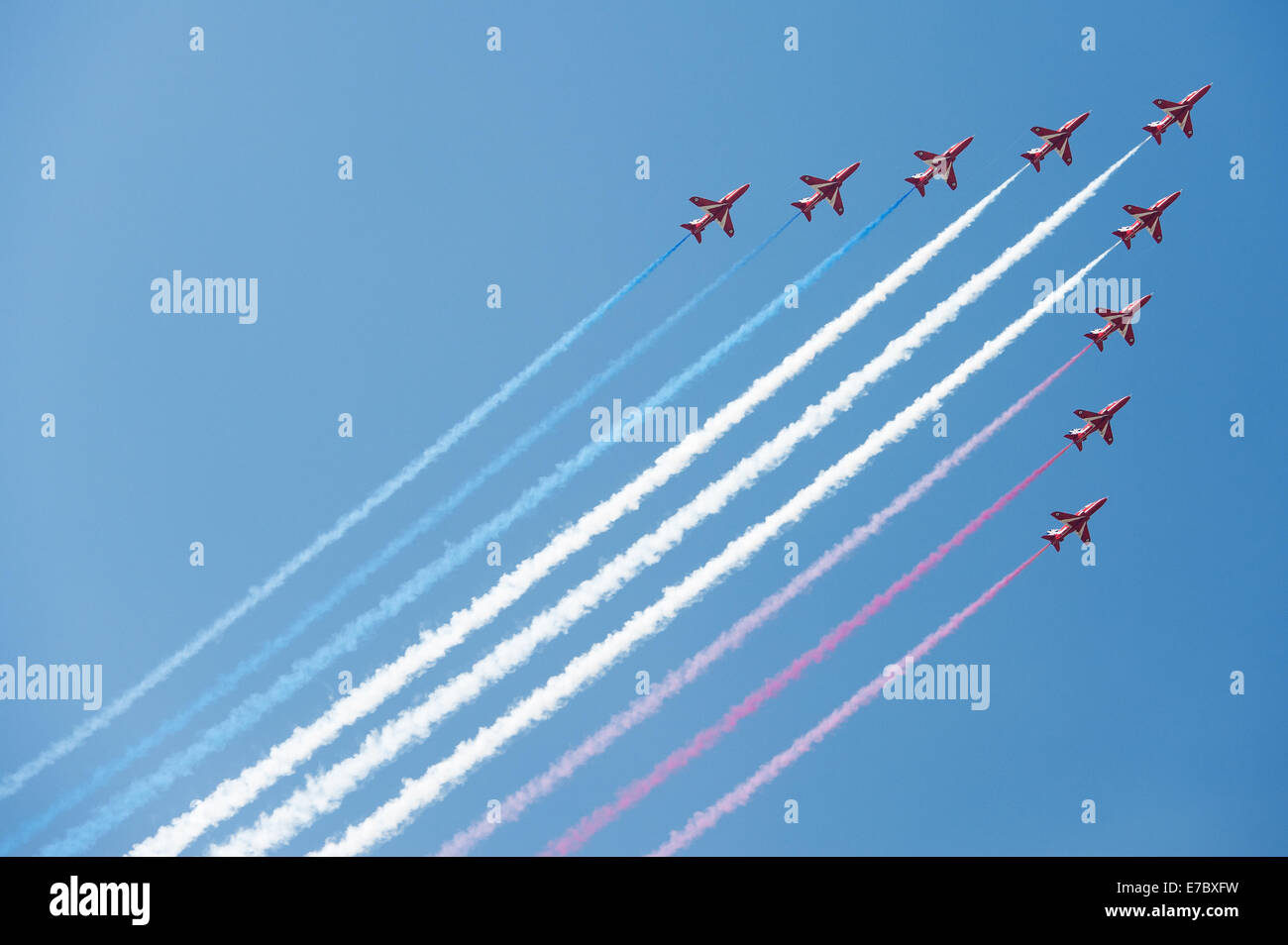 PAYERNE, SWITZERLAND - SEPTEMBER 6: Flight of RAF Red Arrows aerobatic team in close formation on AIR14 airshow in Payerne Stock Photo