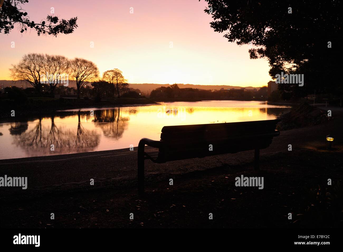 A glowing Sunset above the Anza Lagoon, Burlingame CA Stock Photo