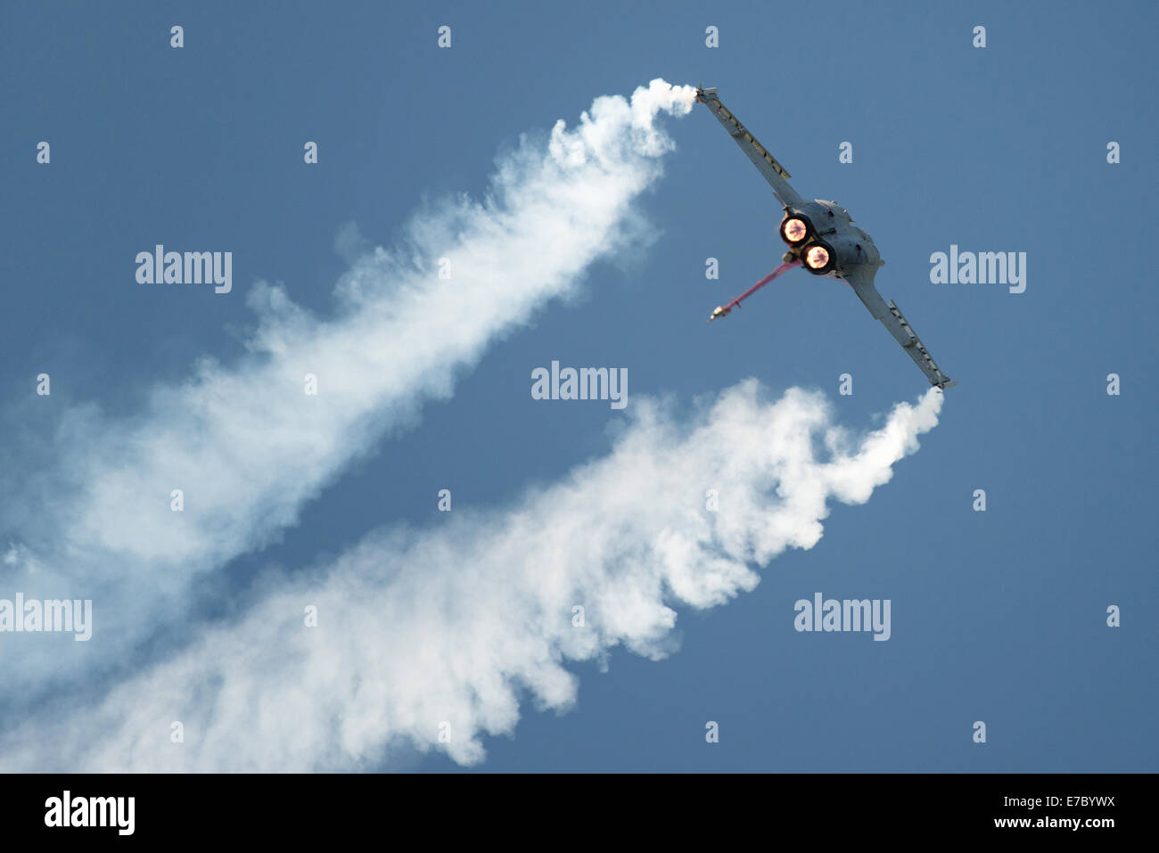 PAYERNE, SWITZERLAND - SEPTEMBER 6: Flight of Rafale jet fighter on AIR14 airshow in Payerne, Switzerland on September 6, 2014 Stock Photo