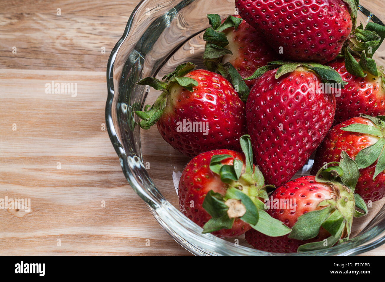 Strawberries in a glass bowl Stock Photo - Alamy