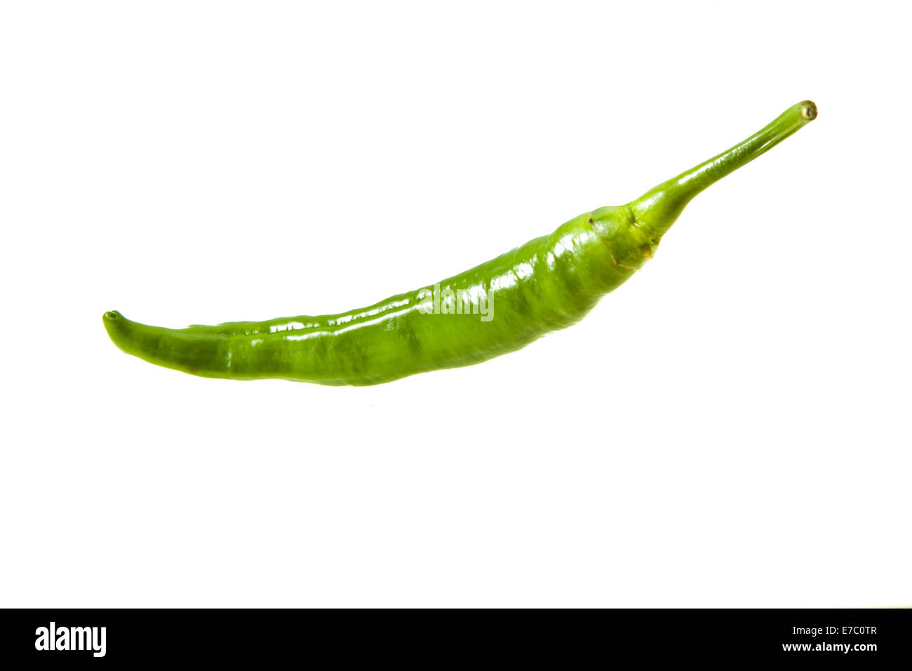Green chili pepper isolated on a white background Stock Photo - Alamy