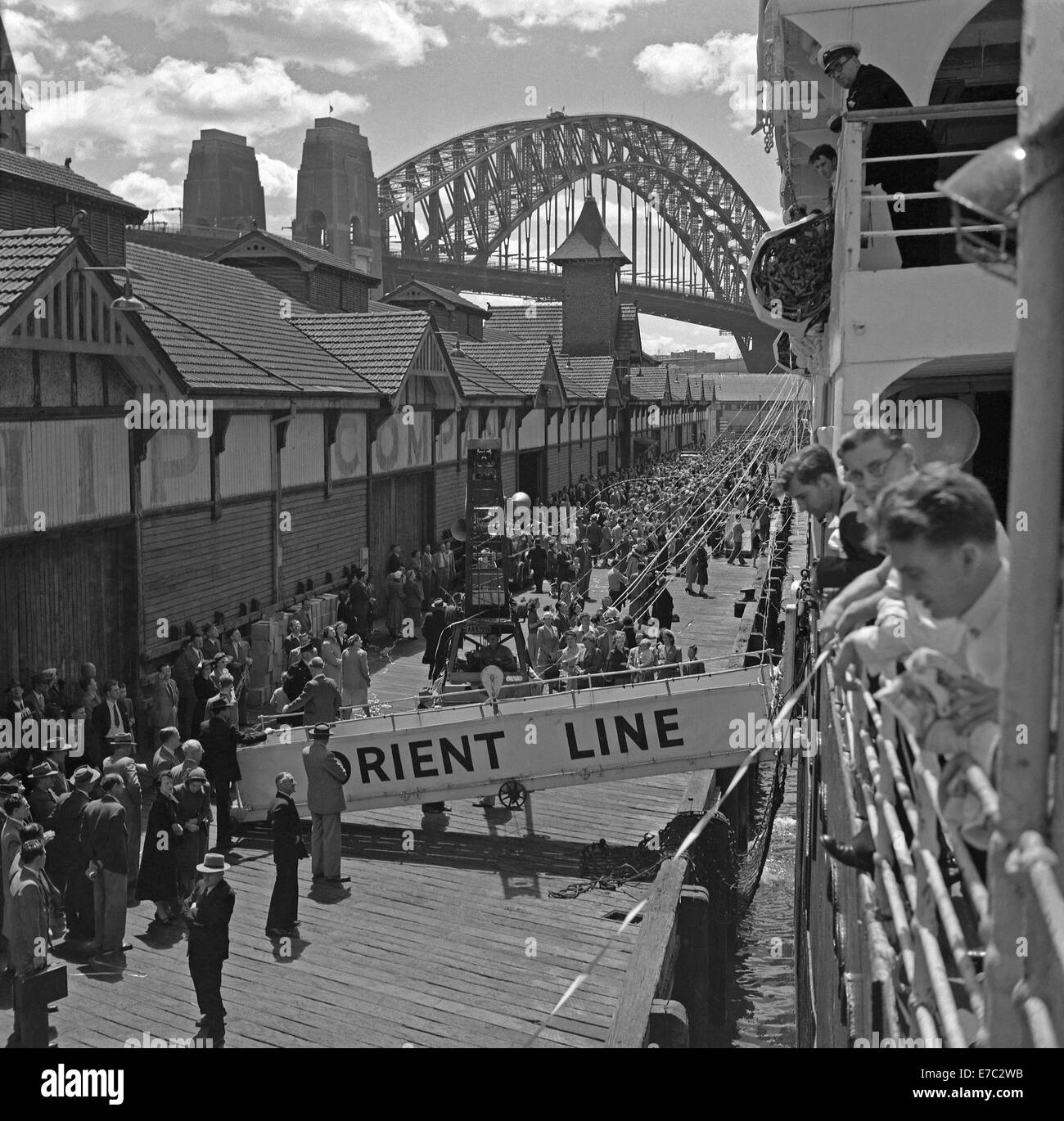 Orient Line passenger ship about to set sail and leave the Overseas Passenger Terminal at Circular Quay, Sydney Harbour, c. 1960 Stock Photo