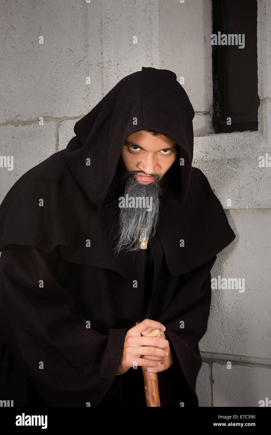 Halloween scene of a hooded black monk Stock Photo