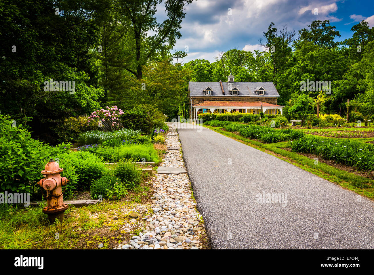 Gardens and a paved path at Cylburn Arboretum, in Baltimore, Maryland. Stock Photo