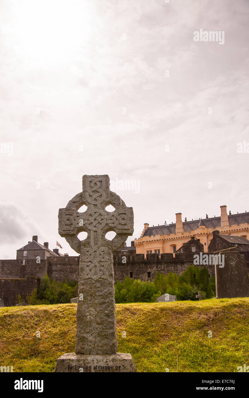 celtic cross headstone on a graveyard Stock Photo