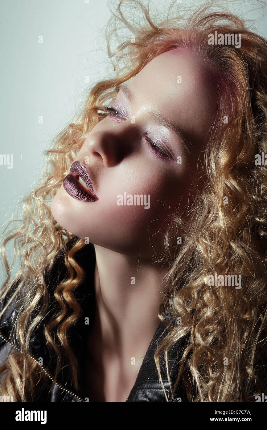 Glam. Profile of Pensive Girl with Trendy Vivid Makeup Stock Photo