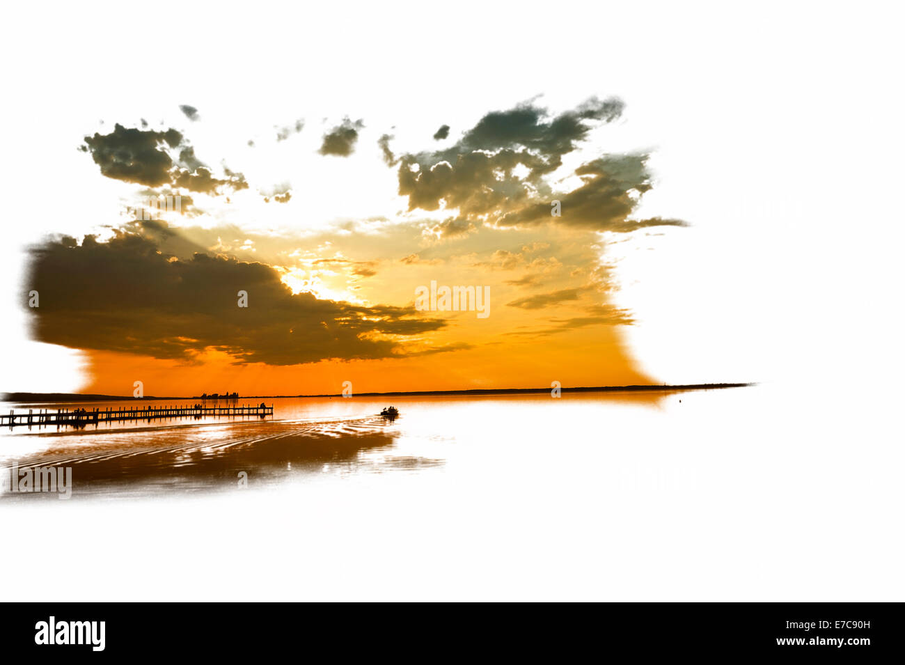 Graphics of Dramatic evening sky above the lake with a wooden pier in the foreground, Steinhude am Meer, Lower Saxony. Stock Photo