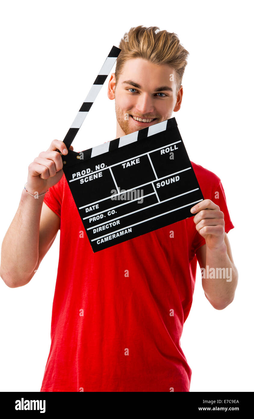 Casual young man holding a clapboard, over a white background Stock Photo
