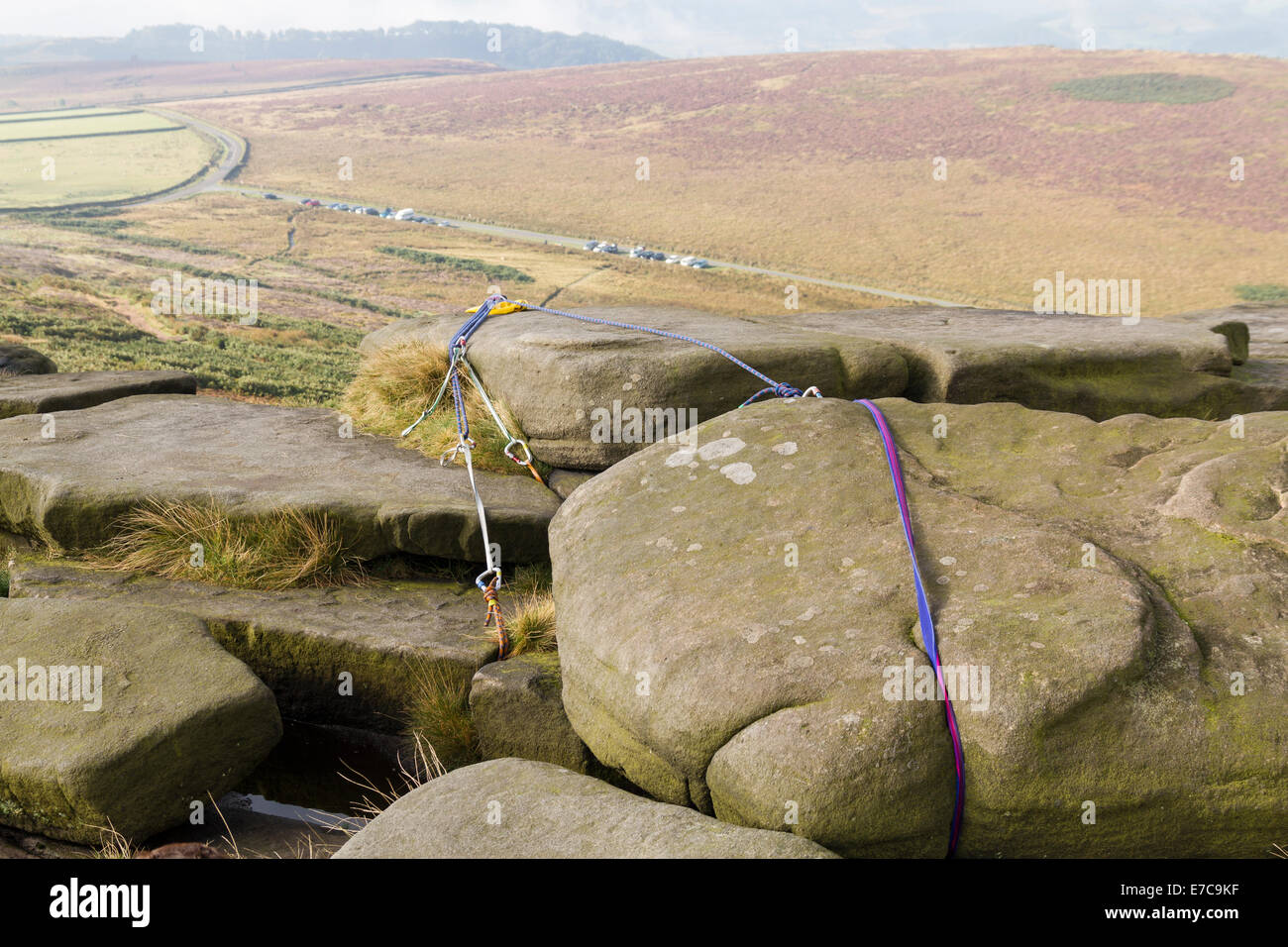Rock climbing belay and safety anchor ropes fixed at the top of a crag