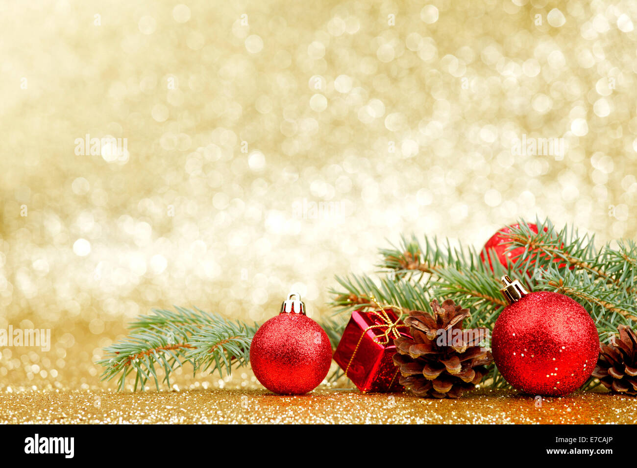 Christmas card with fir and decor on glitter background Stock Photo - Alamy