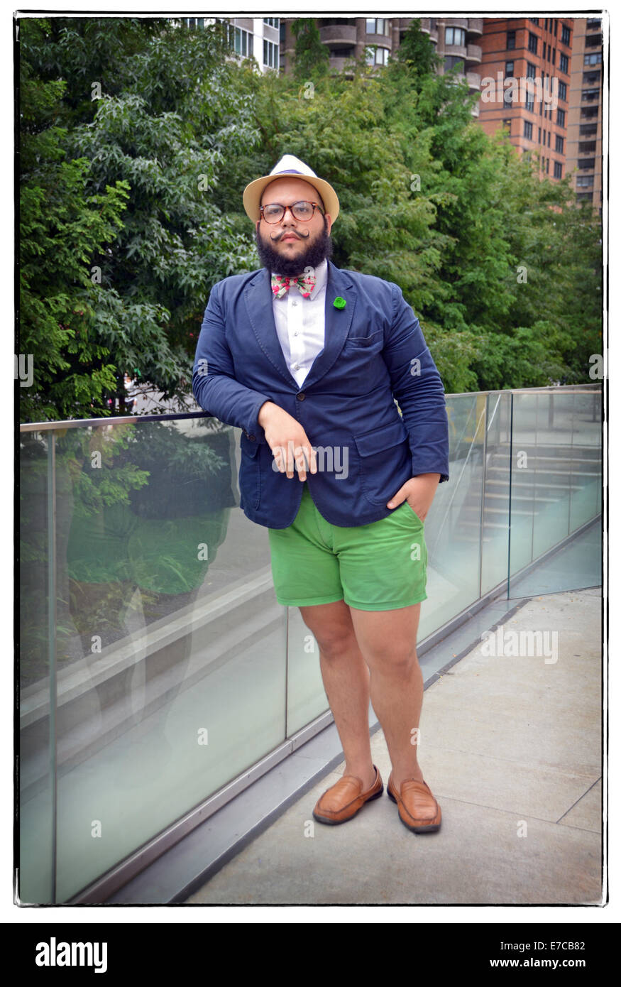 Portrait of a bowtie designer in an unusual outfit at Fashion Week 2014 in New York City. Stock Photo