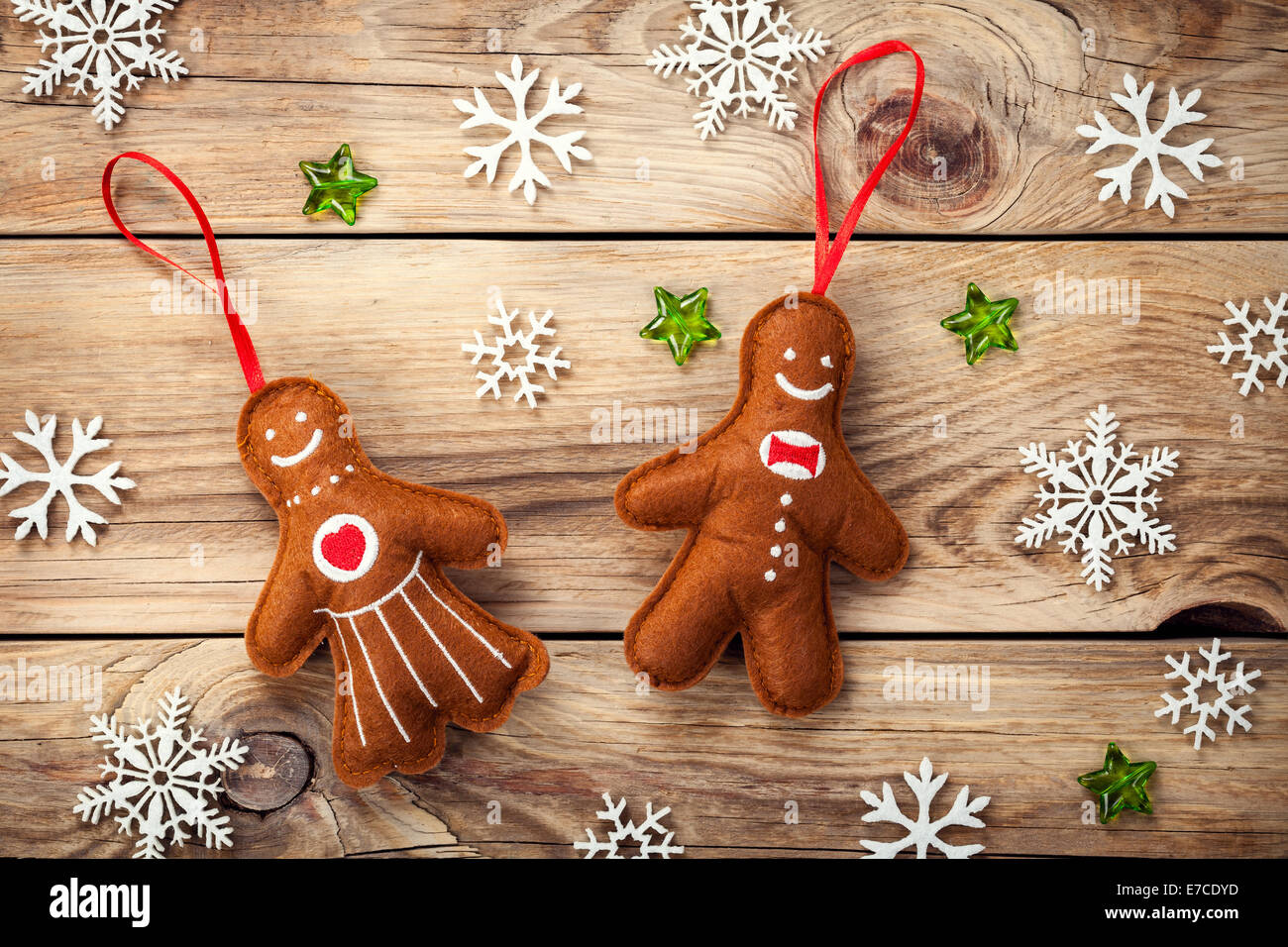 Christmas composition with gingerbread man and woman on wooden table. Top view Stock Photo