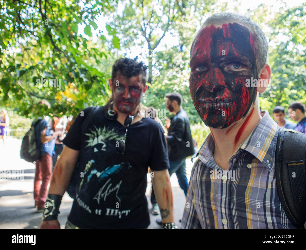 Kiev, Ukraine. 13th September, 2014. People dressed as a zombie parades on a street during a zombie walk -- In Kiev passed the crowd of walking dead. One of the main requirements of the parade was, ''Let's eat brains, but reserve the mud! Credit:  Igor Golovnov/Alamy Live News Stock Photo