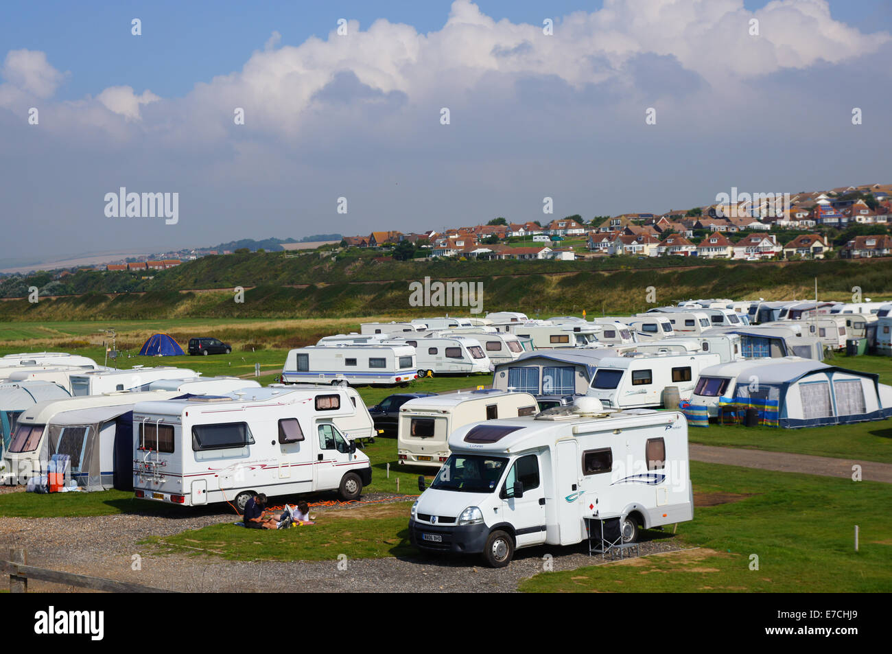 A caravan site, motorhomes caravans campers next to the beach at Seaford East Sussex England United Kingdom UK Stock Photo