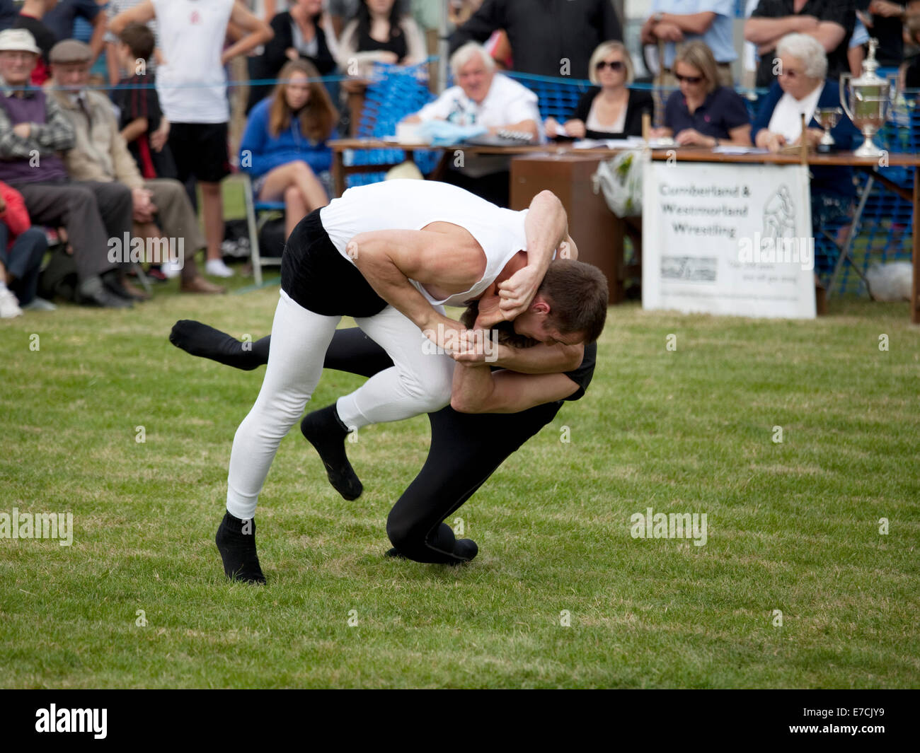 Stanhope, County Durham, England - September 13, 2014: Cumberland and Westmorland Wrestling competition at the Stanhope Show, a traditional Dales agricultural show with displays of livestock, produce and craft from the local area. Cumberland Wrestling is an ancient and well-practised tradition in the north country area of England. Credit:  AC Images/17�Թ����� Live News Stock Photo