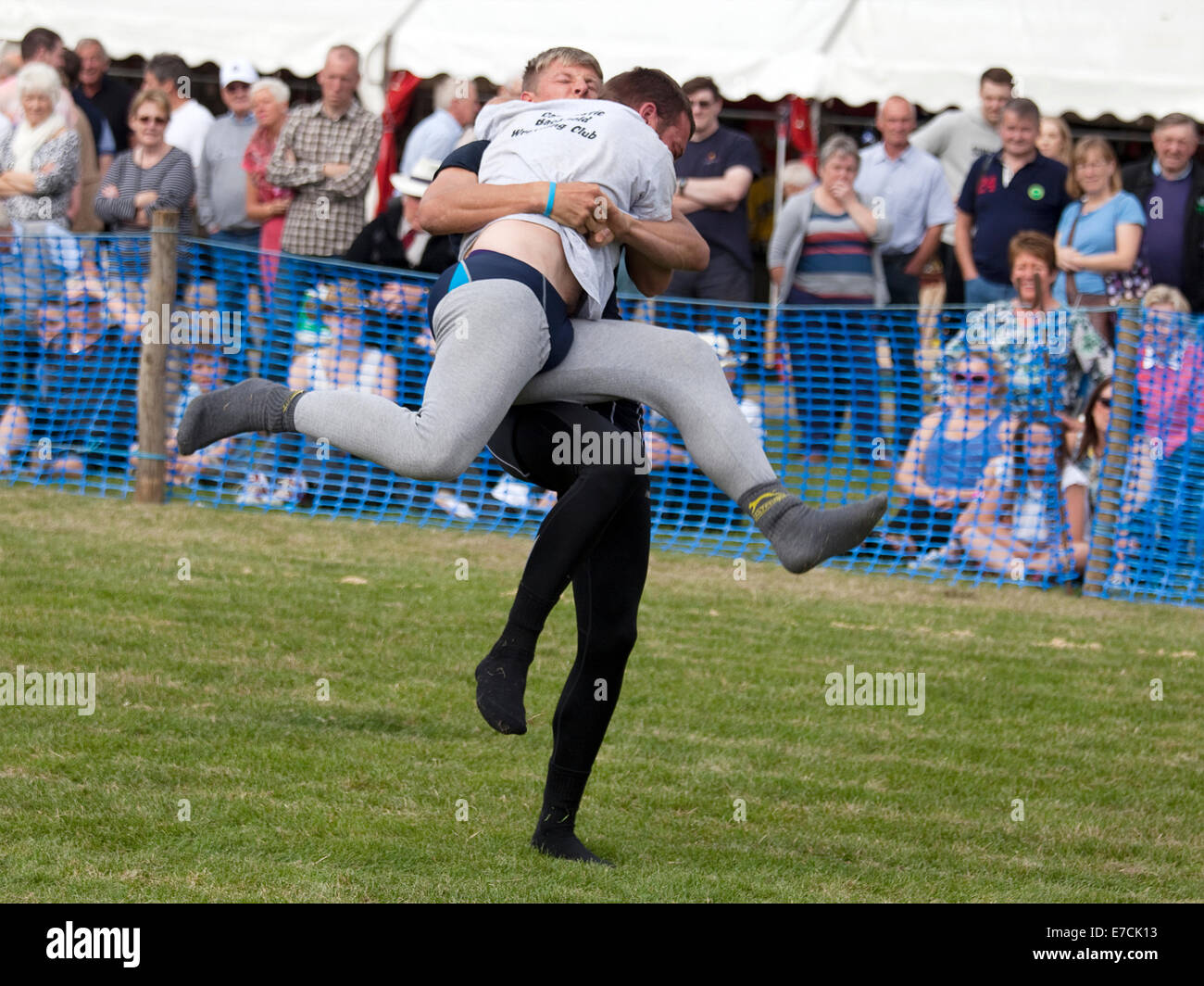 Stanhope, County Durham, England - September 13, 2014: Cumberland and Westmorland Wrestling competition at the Stanhope Show, a traditional Dales agricultural show with displays of livestock, produce and craft from the local area. Cumberland Wrestling is an ancient and well-practised tradition in the north country area of England. Credit:  AC Images/17�Թ����� Live News Stock Photo