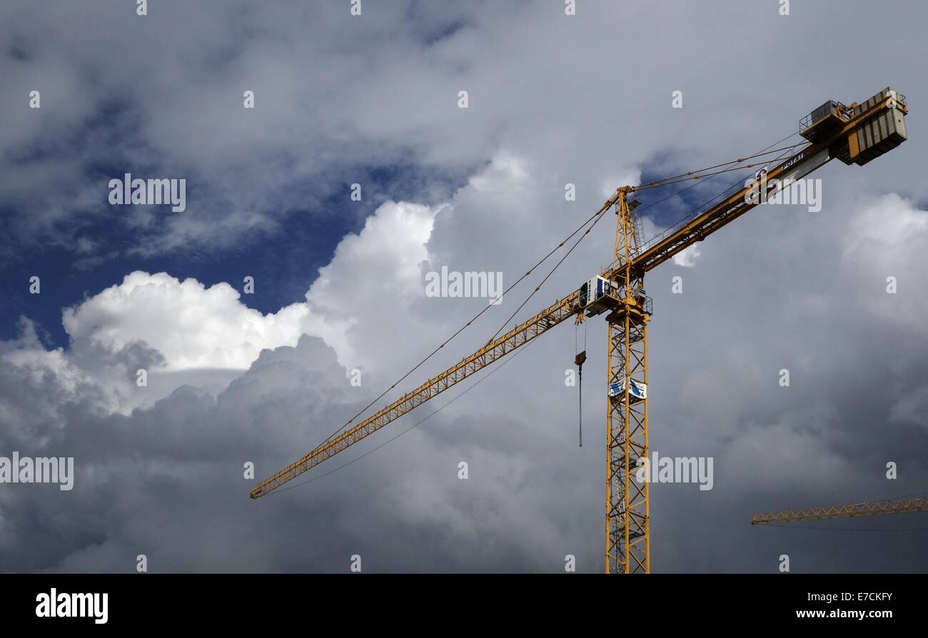 Crane In The Clouds reaching To The Sky Stock Photo Alamy