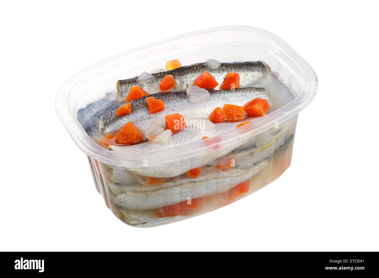 Marinated salted fish with carrots in opened jar isolated on white