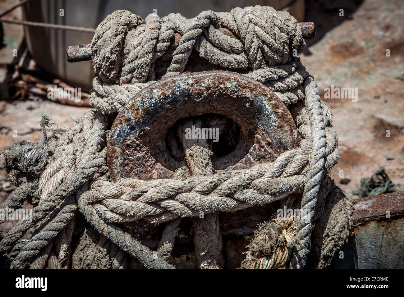 very old rope and cleat of a fishboat Stock Photo