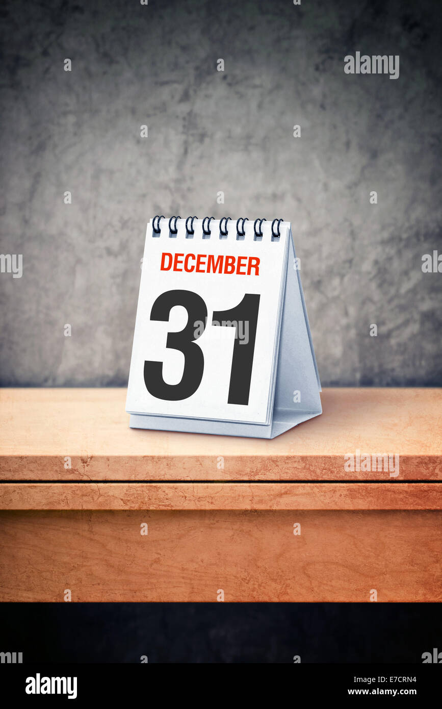 December the 31st on desk calendar at office table. New Year's Eve ...