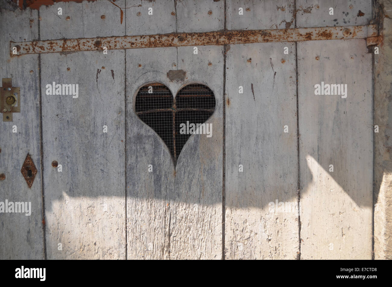 Heart patterns on door, St Antonin Noble Val, Tarn-et-Garonne, SW France May 2014 Stock Photo