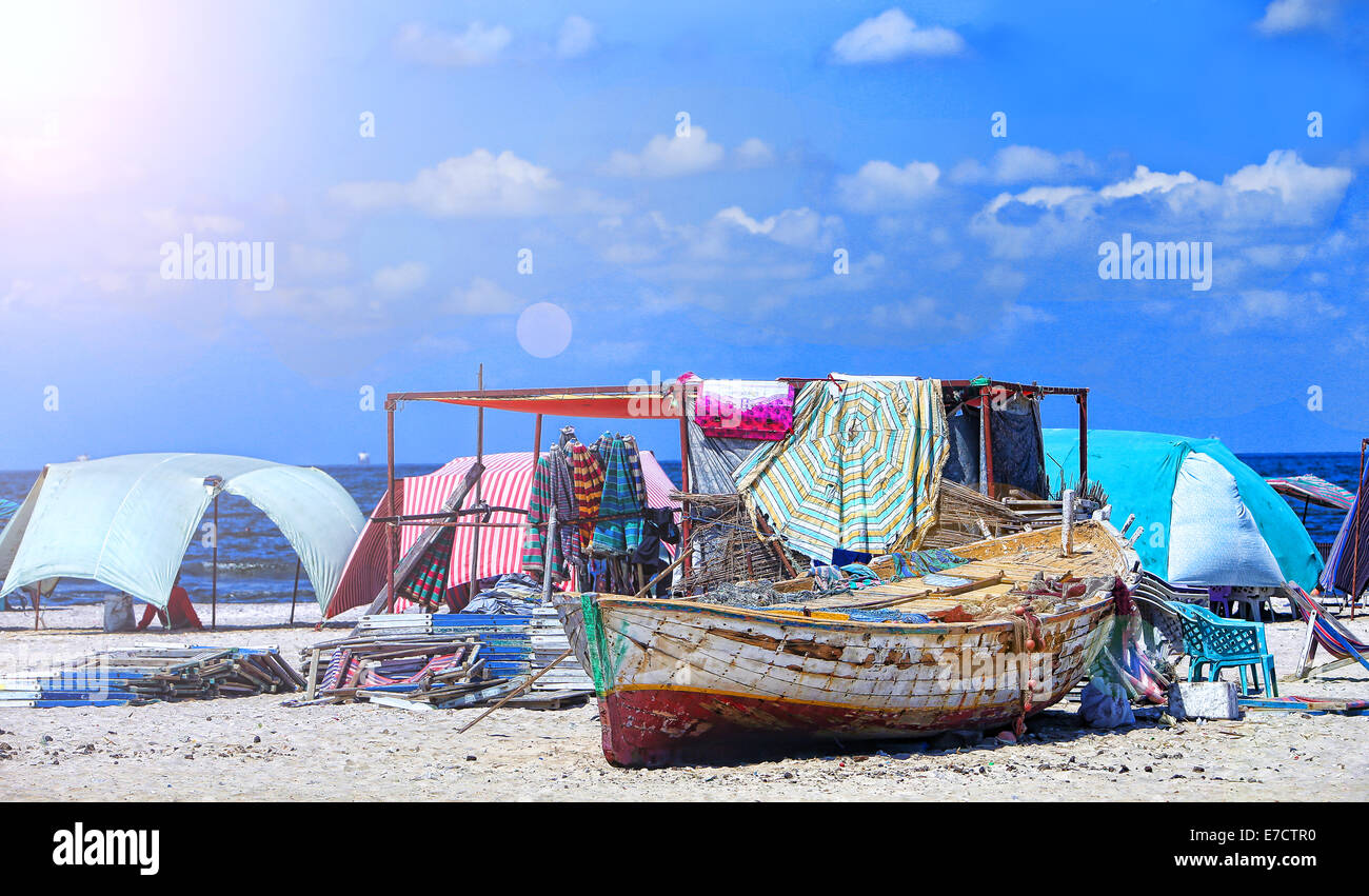 Fishing Boat resting on the shores of the city of Port Said north of Egypt. Stock Photo
