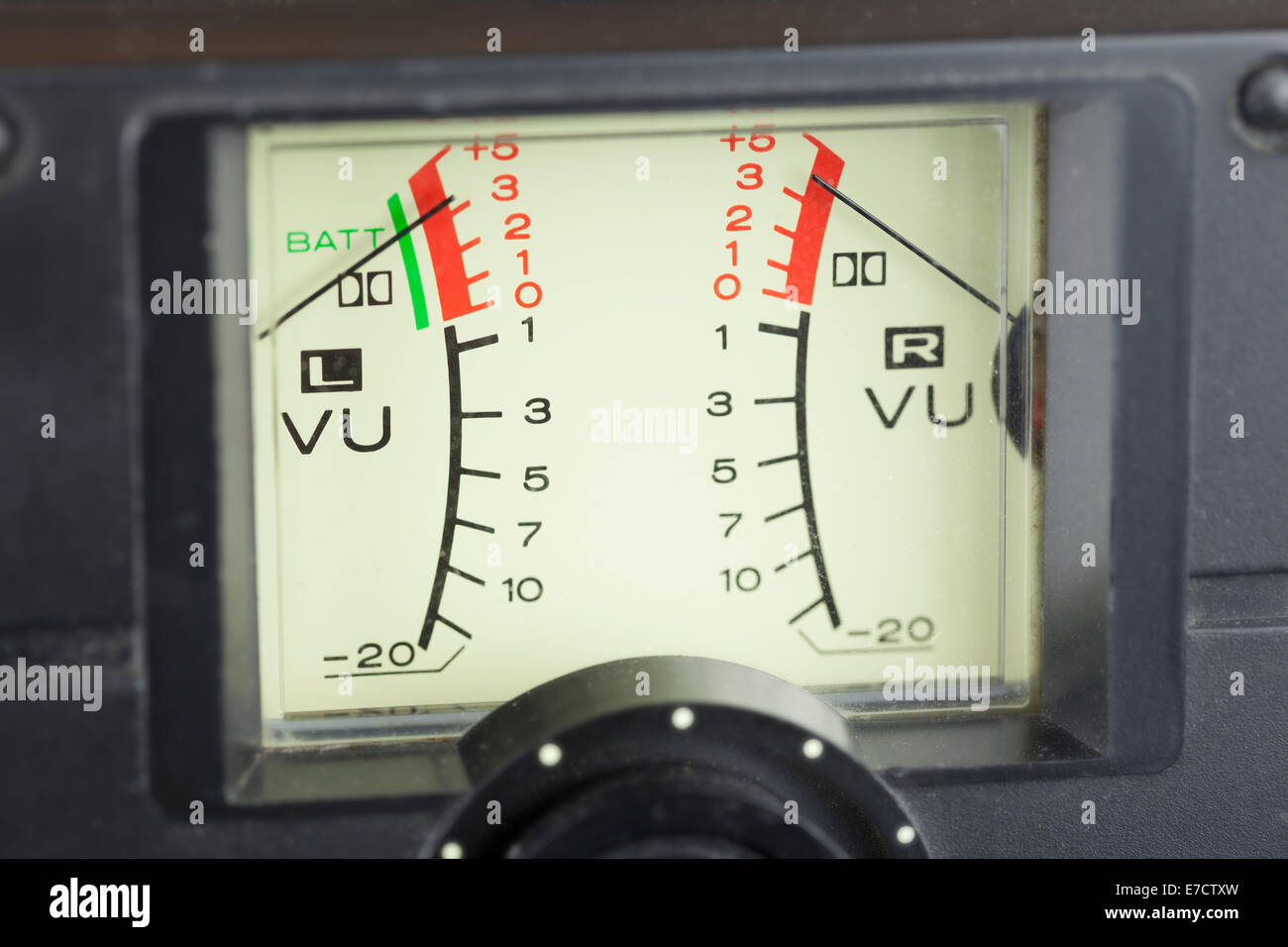 VU meter, audio signal volume unit, with needles in the red Stock Photo