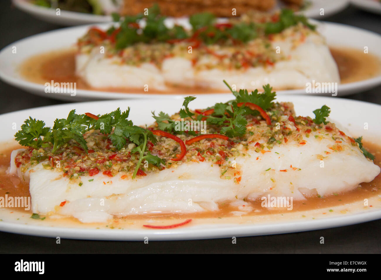 A Fresh steam fish with seafood sauce Stock Photo Alamy