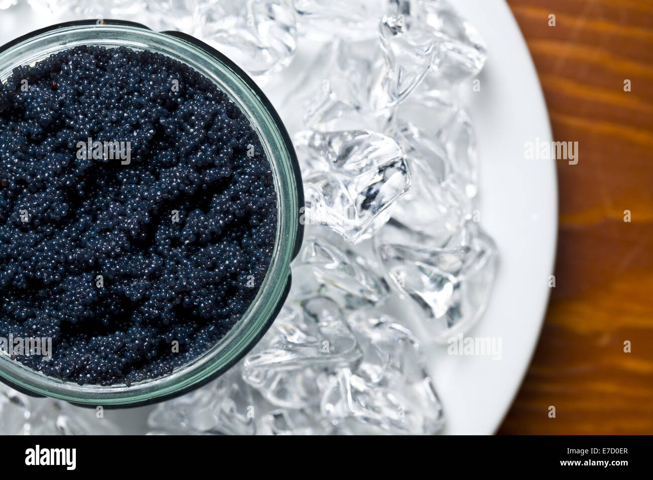 top view black caviar in jar Stock Photo