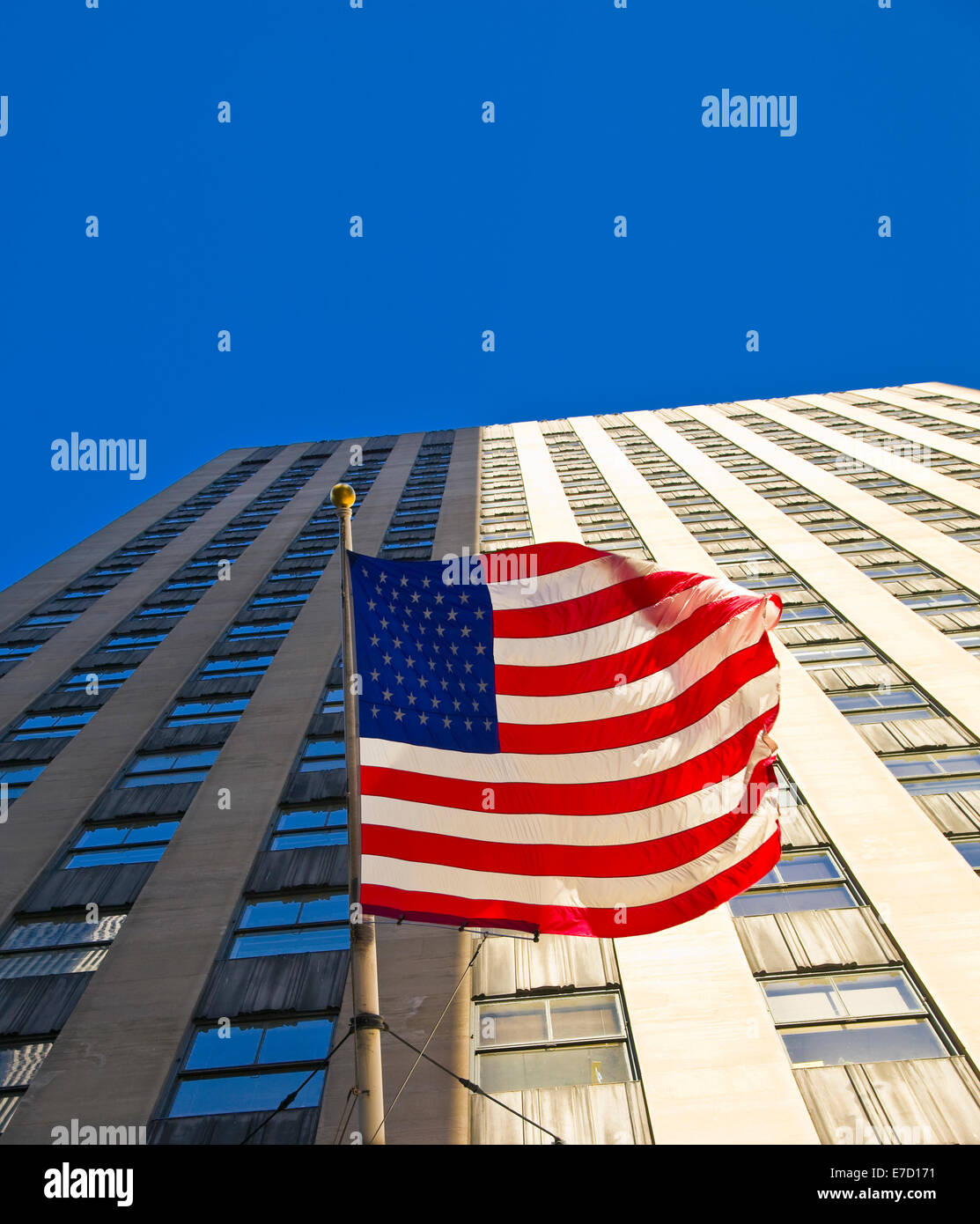 American flag on a skyscraper in New York Stock Photo - Alamy