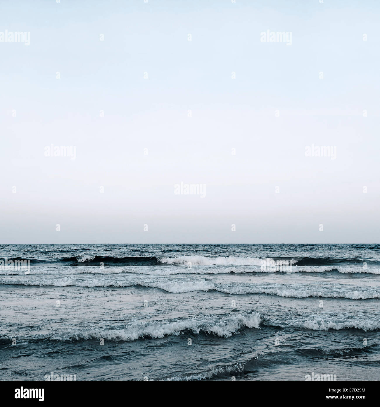 Blue cold sea water and sky background Stock Photo
