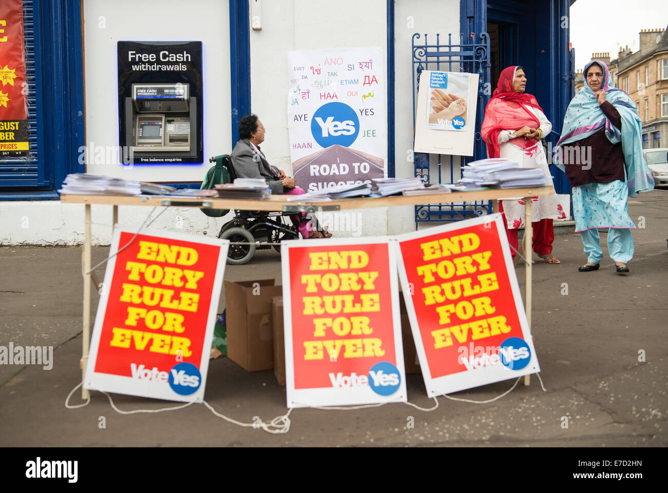 Glasgow, Scotland. 14th September, 2014. Pro-Scottish independence 'Yes Scotland' campaign posters, banners and Saltire flags adorn buildings in the Pollokshields area of the city, on September 14, 2014 in Glasgow, Scotland.  Scotland will vote on whether or not to Leave the United Kingdom in a referendum to be held on September 18th this year Credit:  Sam Kovak/Alamy Live News Stock Photo
