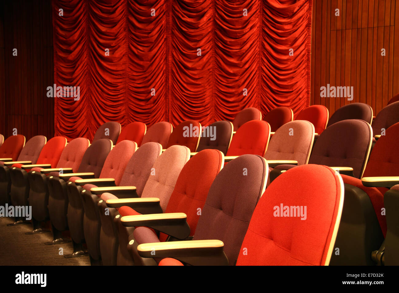 Row of seats in an empty theatre Stock Photo