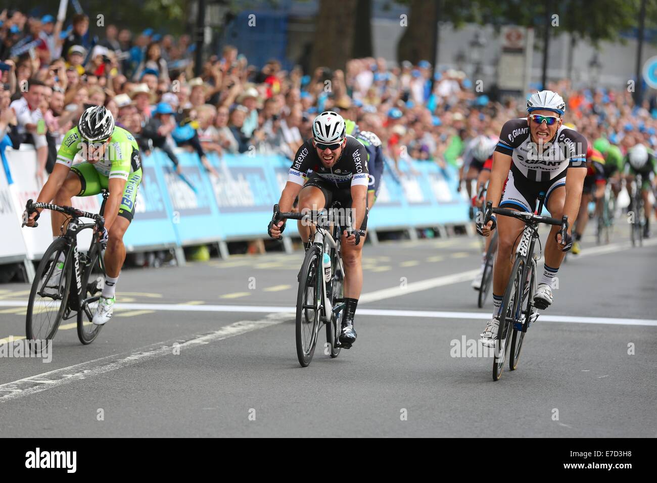 London. 14th September 2014. 2014 Tour of Britain, Stage 8b. London Circuit Race. Marcel Kittel (right) beats Mark Cavendish in the sprint to win the final stage Credit:  Neville Styles/Alamy Live News Stock Photo
