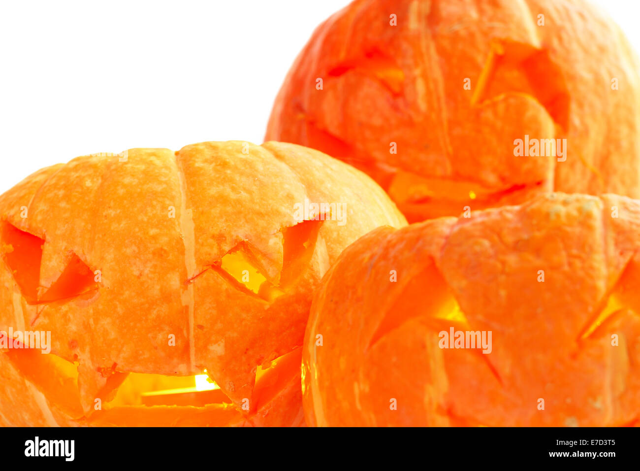 Glowing Halloween Pumpkins isolated on white background Stock Photo - Alamy