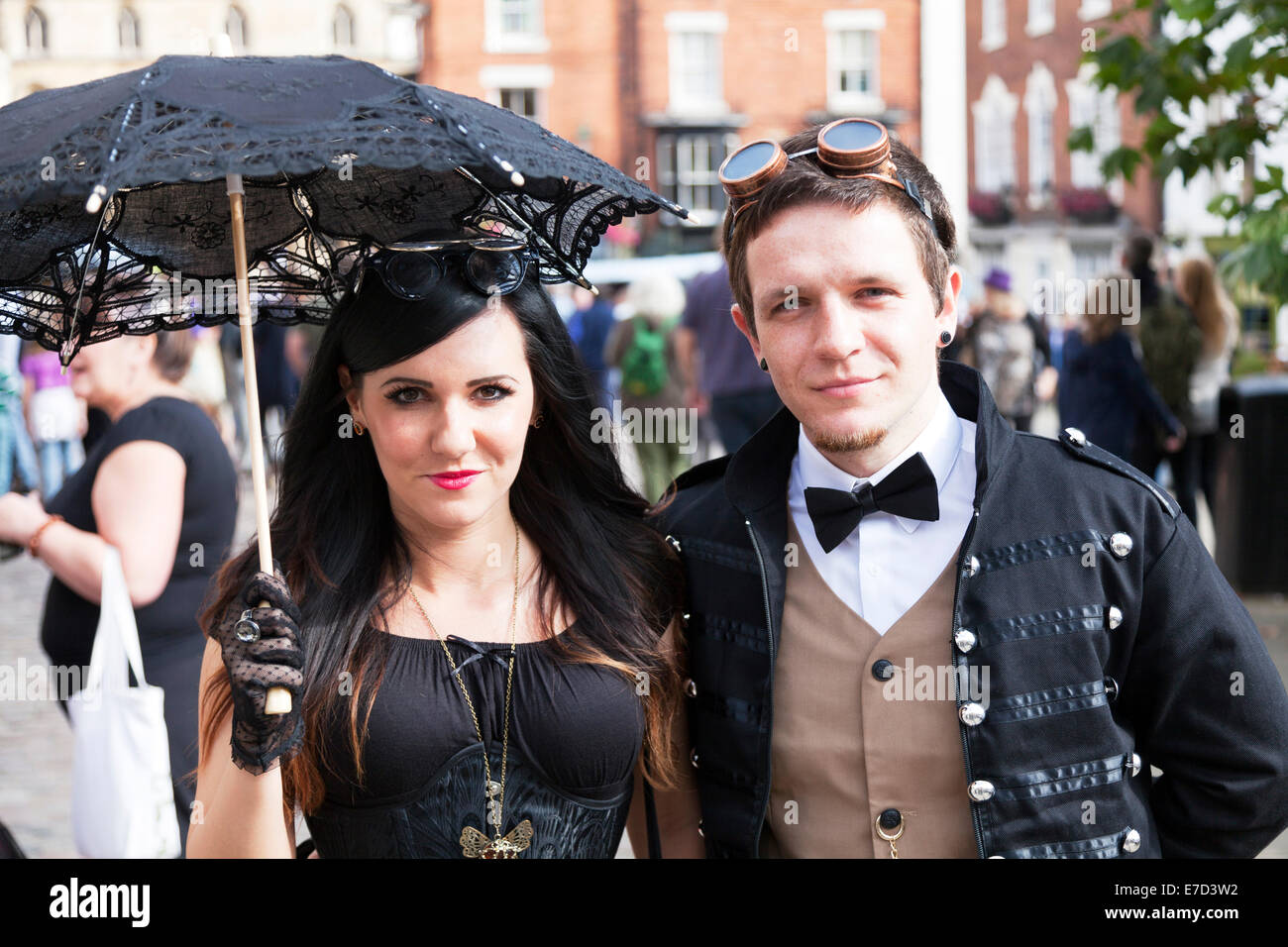 Lincoln, UK. 14th September, 2014. Hailed the most ‘splendid in the World’, the biggest Steampunk festival in Europe returns to Lincoln City, Lincolnshire, UK, England 14/09/2014 for a Weekend at the Asylum VI people wearing fantasy neo-Victorian costumes. From top hats and flying goggles, to corset and flamboyant feathers Credit:  Tommy  (Louth)/Alamy Live News Stock Photo