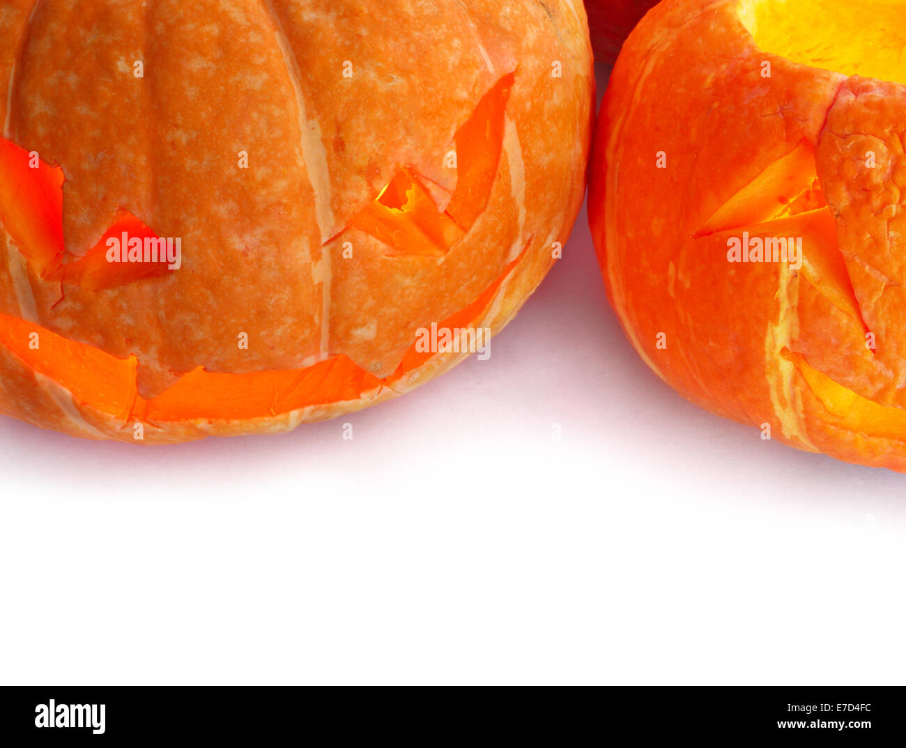 Glowing Halloween Pumpkins isolated on white background Stock Photo - Alamy