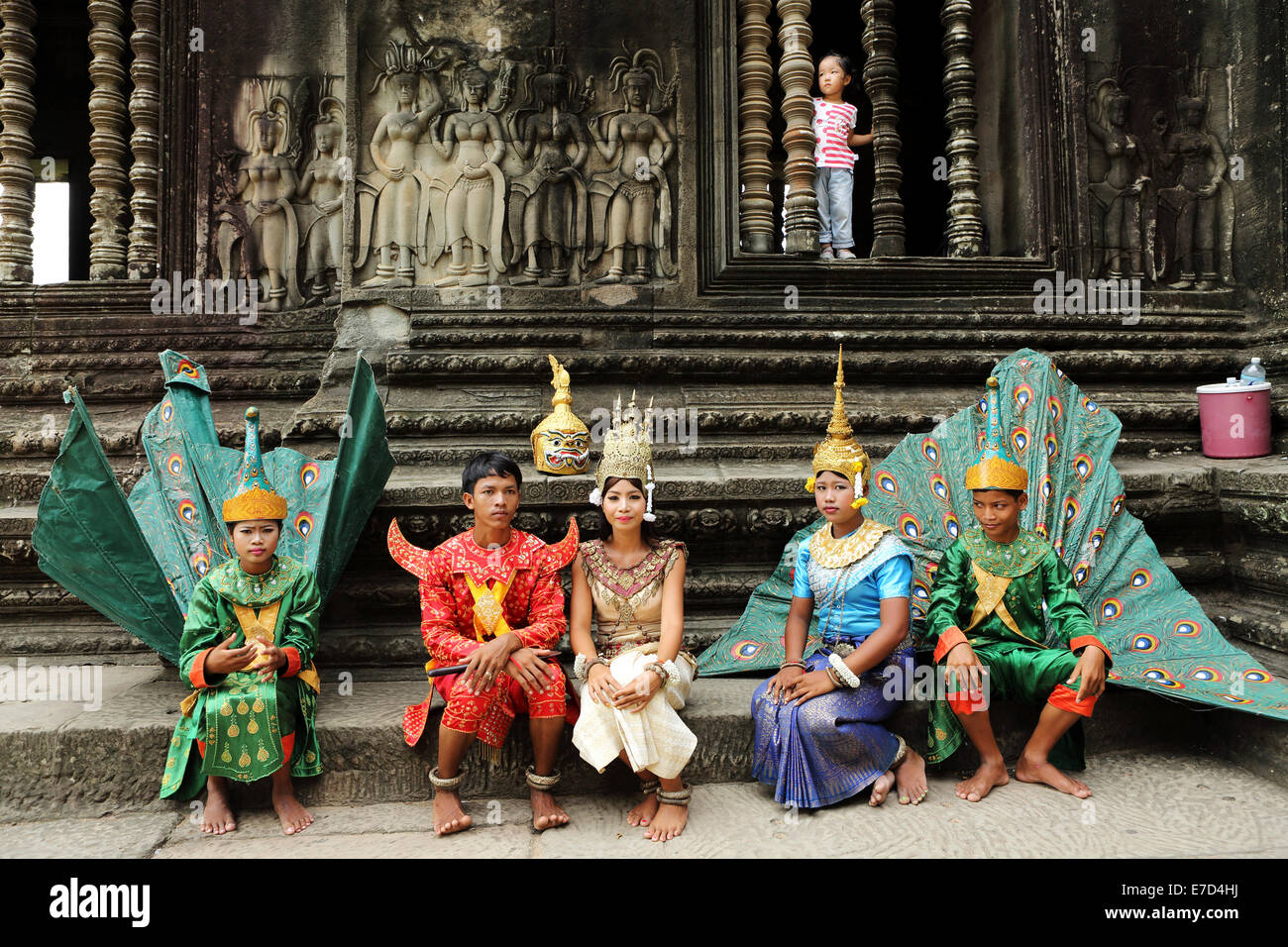 A group of men and women in traditional, Khmer style costumes at Angkor Wat in Siem Reap, Cambodia. Stock Photo