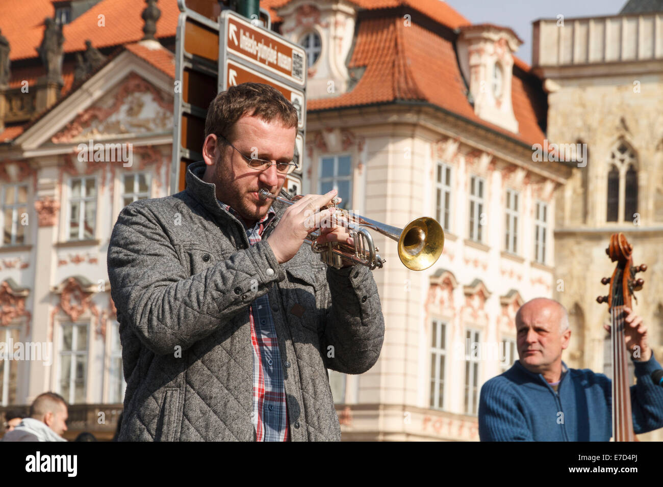 Trumpet double bass player players street performer performers busking busker buskers in an old square in Prague Czech Republic Stock Photo