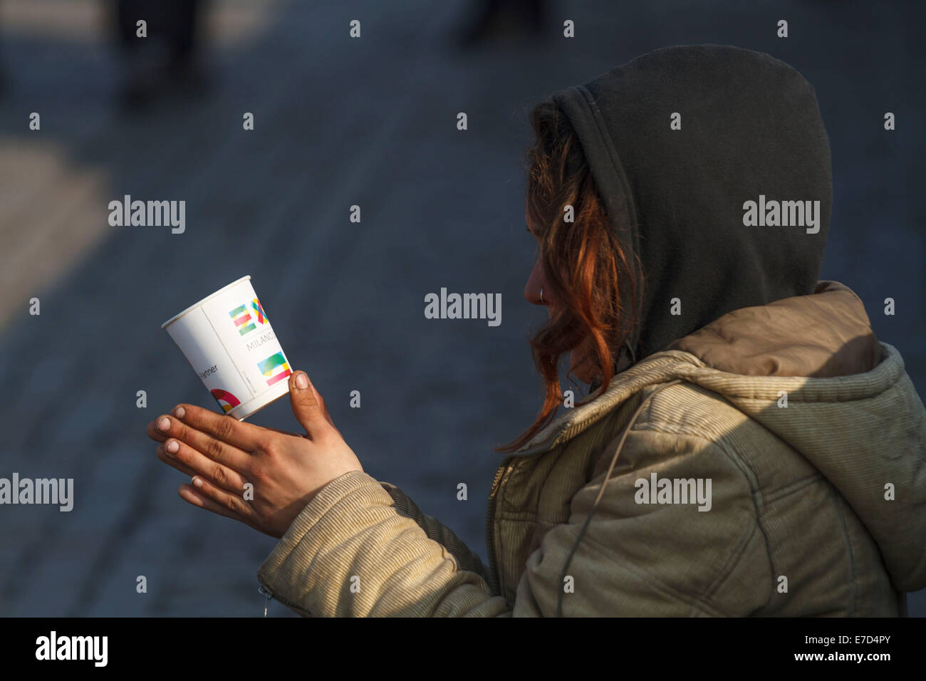 Beggar immigrant migrant refugee begging on street Stock Photo