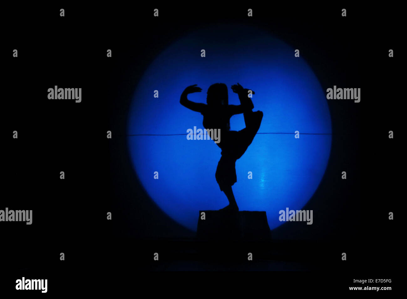 Silhouette of a contortionist in the Cambodian Circus Show, Siem Riep, Cambodia. Stock Photo