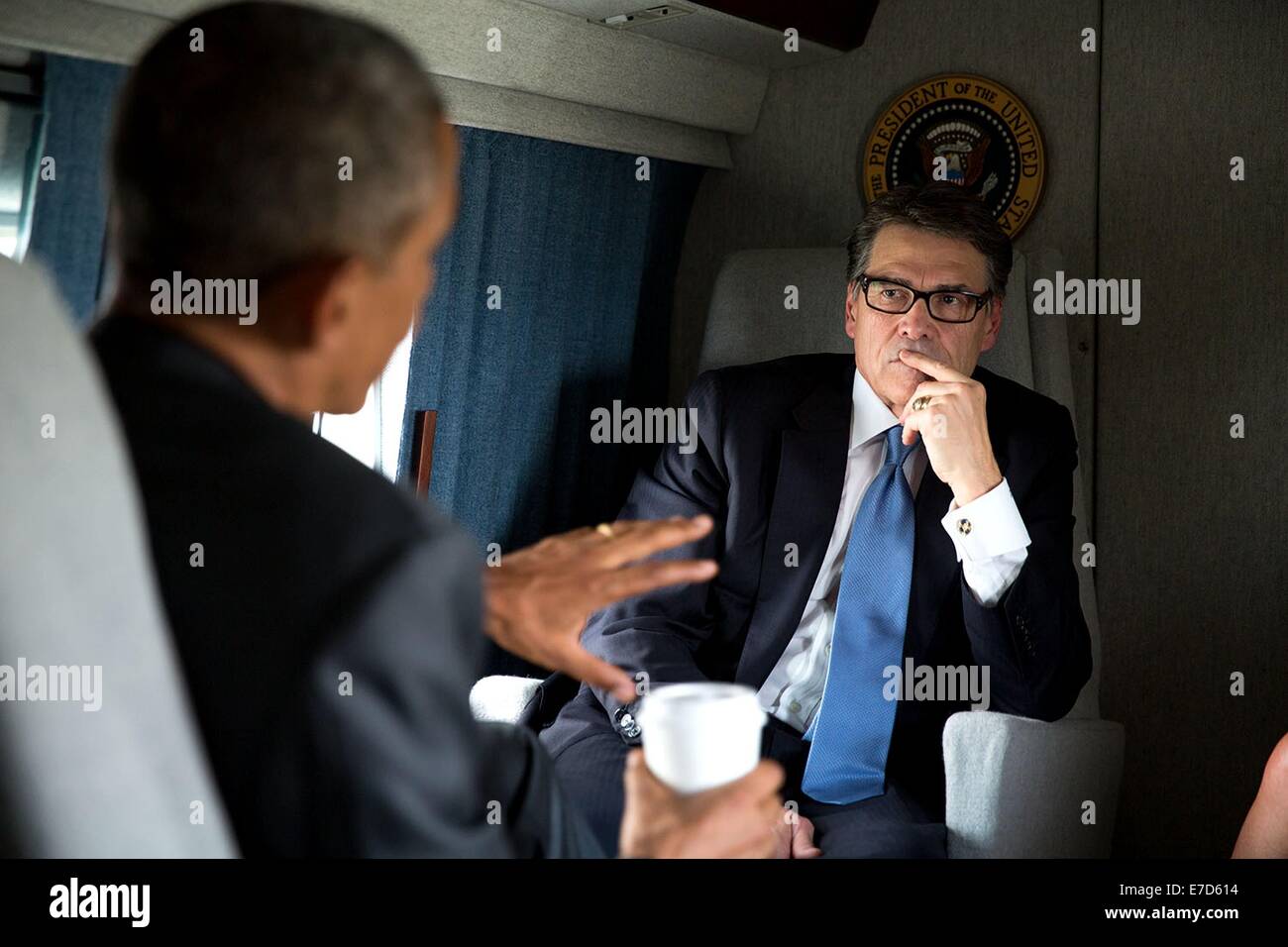 US President Barack Obama and Gov. Rick Perry discuss the border crisis while traveling aboard Marine One from Dallas/Fort Worth International Airport to Dallas Love Field July 9, 2014 in Dallas, Texas. Stock Photo